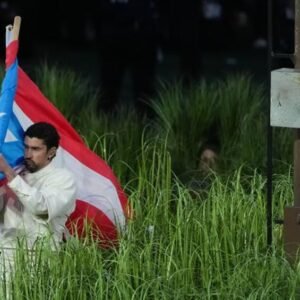Bad Bunny’s Halftime Show Sparks Controversy Over Burning Flag Video - Thumbnail