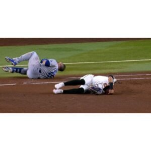 Shocking Collision: Max Muncy Exits Game After Head-On Hit - Thumbnail
